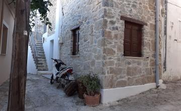 South Crete Graphic Traditional Stone House